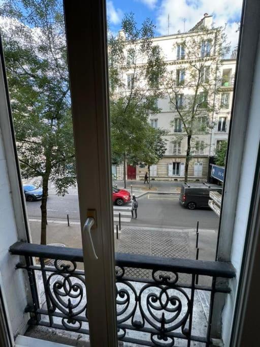 Charmant Appartement Alesia Paris Exterior foto